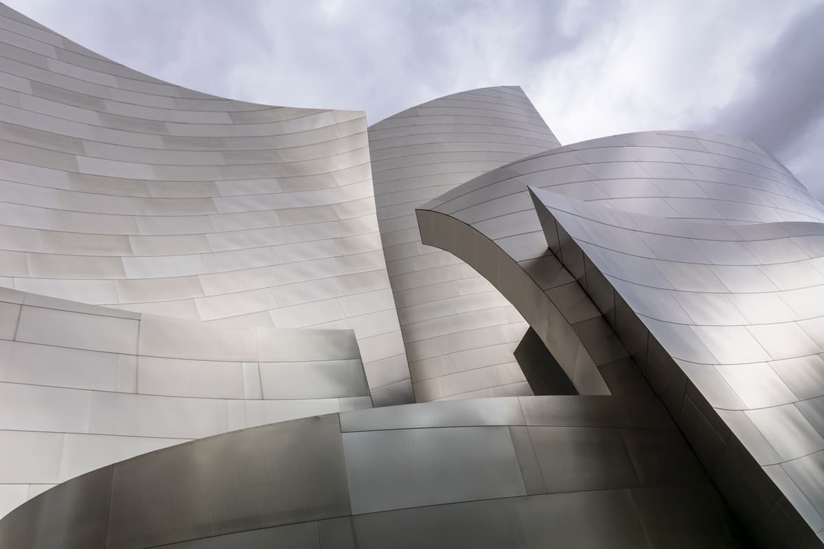 Metal facade cladding material
